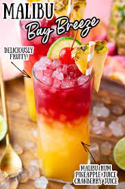 Absolut kurant vodka, amaretto, chambord raspberry liqueur, cranberry juice, grand marnier, malibu rum, midori, pineapple juice. Malibu Bay Breeze Cocktail Recipe Sugar And Soul