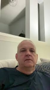 Brett Rossi Selfies Pic with A Dog in A Car