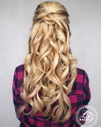 For a festive prom night look, wear a low loose bun with lots of curls and natural texture. 31 Cute Easy Prom Hairstyles For Long Hair For 2021