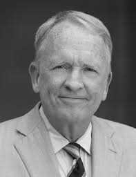 PRESIDENT POSTEL DISCUSSES PLANS AT ANNUAL MEETING