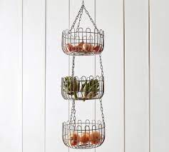 Wire basket, wall hanging basket, farmhouse style, vintage style round, kitchen chareststudios 5 out of 5 stars (759) $ 37.50 free shipping add to favorites copper tone metal wire storage basket, set of 2 mygiftus 4.5 out of 5 stars (4,368) $ 31.49 free shipping add to favorites. Farmhouse Wire Hanging Fruit Basket Kitchen Accessories Pottery Barn