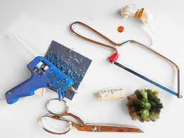 Wrap the white yarn around the palm of your hand multiple times until you get to the size you want it to be once done. Handmade Pom Pom And Cork Tree Christmas Ornaments Tuesday Stitches