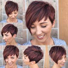 Shaggy Asymmetrical Pixie With Asymmetrical Bangs On Highlighted Burgundy Hair Short Hair Styles Pixie Thick Hair Styles Short Hair Styles