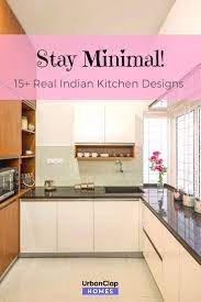 White Is The Perfect Colour For A Minimal Kitchen Look Along With Wooden Cabinets To Add To The Des Kitchen Design Images Kitchen Design Interior Kitchen Small