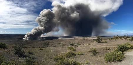 A towering volcanic gas and ash cloud rising above the summit caldera, AI generated