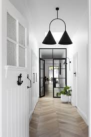 Real Reno Melbourne Bayside Bungalow S Modern Makeover The Interiors Addict Bungalow Interiors Bungalow Renovation Hallway Designs
