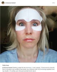 Kristen Bell wears plunging gown