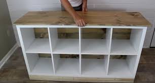 Man Demonstrates How To Change A Piece Of Ikea Furniture To A Beautiful Diy Kitchen Island Ikea Kitchen Island Ikea Shelving Unit Diy Kitchen Island