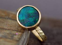 Women want a ring that is going to be seen from far away, but they also want a ring that is lightweight and. Black Opal In Recycled 18k Yellow Gold Ring Made To Order In 2020 Black Opal Ring Opal Jewelry Jewelry
