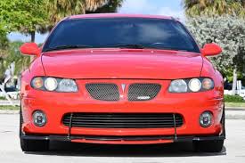 Image result for Bright Red 2004 Pontiac