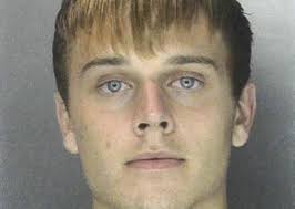 Sweet Frog robbery suspect was already