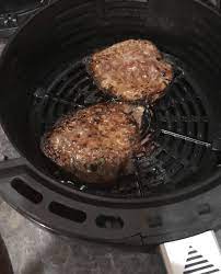 First, put the frozen turkey burger in the air fryer basket or on your air fryer tray. Air Fryer Burgers From Frozen To Cooked In 15 Minutes