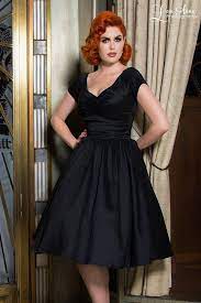 Pinup Couture Ava Swing Dress In Black Taffeta Pinupgirlclothing Com Pinup Couture Vintage Style Dresses Swing Dress