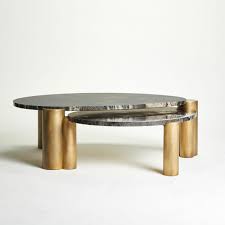 Coffee tables can be used to display a small stack of your favorite books, a vase a fresh flowers or a beautiful centerpiece bowl. Xenolith Table In 2021 Stone Coffee Table Coffee Table Design Table