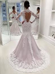 Lace long sleeve dress with an illusion neckline and a small train sheath white lace wedding dress makes you look like a snow queen Stunning Lace Sequins Long Sleeve Mermaid Open Back Wedding Dresses Ab1514 Long Sleeve Mermaid Wedding Dress Wedding Dress Sleeves Open Back Wedding Dress