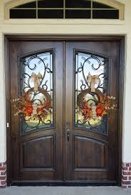 Andersen® residential entranceways are handcrafted from the finest wood available and introduce your home with uncommon elegance. Custom Double Doors Doors Door Entry Door Front Door Exterior Door Custom Door Exterior Doors Double Front Door Wreaths Front Entry Doors Iron Front Door