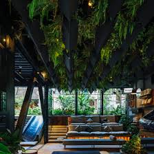 11 instagramable hotels in bandung · 1. Plants Cover Grey Steel Of Hotel Click Clack Medellin By Plan B Arquitectos