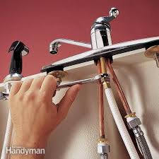 With or without a drainer? Replace A Sink Sprayer And Hose Faucet Repair Kitchen Sink Faucets Faucet