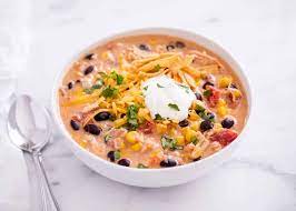 Chicken tortilla soup is delicious mix of chicken onion and cheese. Slow Cooker Chicken Enchilada Soup I Heart Naptime