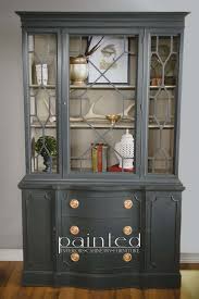 Shabby chic is a type of design in which you artfully make something new like clothing, furniture, or even wall paint appear to be old and worn over the years. China Cabinet Painted In Annie Sloan Graphite And French Linen