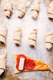 Crescent Pizza Rolls Are A Snap To Make Simply Roll Out Layer With Pizza Sauce Pepperoni And Mo Crescent Recipes Crescent Roll Pizza Crescent Roll Recipes