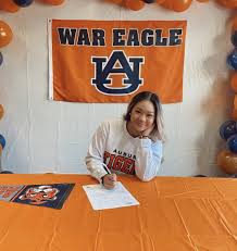 Sunisa lee does homework on the couch of her st. World Champion Gymnast Signs With The Tigers The Auburn Plainsman