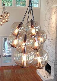 Caviar Pendant Clusters Arteriors Home Lighting For A Large Room With High Ceilings Large Chandelier High Ceilings High Ceiling Lighting Rustic Lighting
