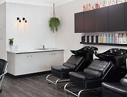 Black Grey And White Hair Salon Provides A Touch Of Modern Vintage Glamour Cabinets In Polytec Sto Salon Interior Design White Hair Salon Hair Salon Interior