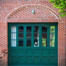 Large area with fire pit and picnic table. Maryland Red Brick Fire House With Dark Green Doors Red Brick House Exterior Green Door Brick House House Doors Colors