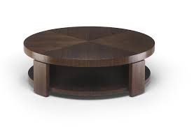 Each is a piece of art meant to be used, not just admired. Circular Coffee Table With Open Shelf