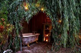 It's made out of recycled lumber, approx. 28 Most Incredible Outdoor Tub Ideas For An Invigorating Experience