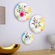 These exquisite handmade ceramic floral objects, inspired by nature, are the perfect summer garnish for dinner tables, shelves, and side tables. Ceramic Wall Plates With Beautiful Flowers Design Art Wall Hanging Pl Wallmantra