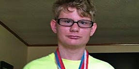 Football: Hackett's Football Team Enjoys A Special Relationship With  Autistic Kicker