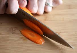 • the knife handle shouldn't be held in a death grip: How Do You Julienne Carrots Without Almost Losing Fingers Cooking