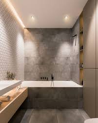 While creating a contrast look, the wood floor also makes all items above it more prominent. 25 Trendy Grey Bathroom Designs Digsdigs