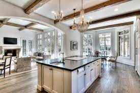 Open Concept Floor Plan For Kitchen Breakfast And Living Room Areas Large Windows And French Doors Allow Lots Of Natural Lig Kitchen Style House Design Home