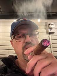 Enjoying a well aged Torano Exodus 59 while watching a mink play in the  creek and a few deer passing through. Smoke tent relaxation never lets me  down