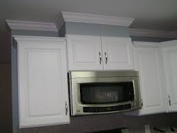 Cabinets with crown molding can add a nice polished look to your kitchen, and it is a project you should be able to complete in just a few hours. A Friend Who Is Very Amp Quot Kitchen Savvy Amp Quot Suggested I Do No Crown Molding At The Top Kitchen Soffit Above Kitchen Cabinets Kitchen Cabinet Remodel