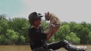 He croons ballads, shoots guns, and puts it all on youtube. Tiger King Gifs Popsugar Entertainment