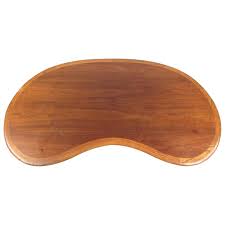 The kidney shape echoes the curve at the top of the driveway. Vintage Walnut Kidney Shaped Coffee Table For Sale At 1stdibs
