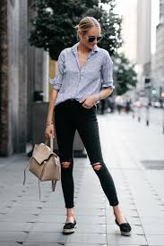 Black And White Striped Shirt With Jeans Blonde Woman Wearing Blue White Stripe Shirt Black Ripped Skinny Jeans Celine Mini Belt Bag Stuart Weitzman Outfits With Striped Shirts Fashion Jackson Fashion