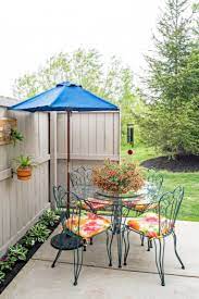 Three years ago, my husband dug out layers and layers of dirt and gravel in our backyard to build our own patio space. Diy Small Patio Ideas On A Budget You Ll Be Crazy About Bless My Weeds