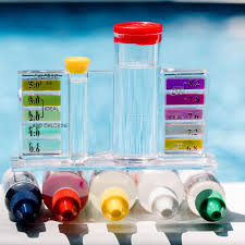 a pool test kit to check water