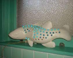 Vintage ceramic fish brooch by madamelaruejewelry on etsy. Pin On Ideas For The House