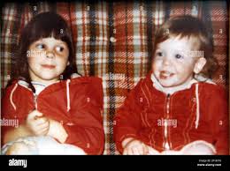 KRT US NEWS STORY SLUGGED: SCI-BROTHERS KRT PHOTOGRAPH VIA CHICAGO TRIBUNE  (April 14) Julie Mark, 5, left, and her brother Jeffrey, the night before  they and their parents were murdered in Cedar