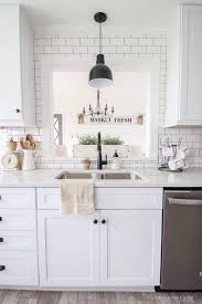 Are all white kitchens going out of style 2021 summer. Touches Of Lace And Other Feminine Fabrics Soften This Beautiful Farmhouse For Easy Summer Style In 2021 Home Decor Kitchen Easy Home Decor Home Decor Tips