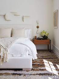 The white color breaks the monotony of a simple gray room. 21 White Bedroom Ideas For A Serene Space White And Brown Bedroom Off White Bedrooms White Bedroom Furniture