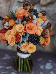 This gorgeous silk, permanent botanical wedding bouquet is a stunning mix of real touch peach and coral roses, and rich navy blue real touch lilies, sprinkled throughout are wild blue berries, all surrounded by eucalyptus and assorted evergreens, hand tied with the stems wrapped in deep navy,online shopping for fashion,promotional goods,best quality,the luxury lifestyle portal,all for great. Apricot Rose Peach Celosia Blueblack Viburnum Tinus Berry Handtied Bouquet Design Twistedwillowweddings Com Fall Bouquets Orange Bouquets Bridal Bouquet