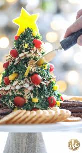 Our most festive new year's recipes. Christmas Tree Cheese Ball Appetizer Recipe Holiday Christmas Appetizer Recipe Christmas Party Food Christmas Appetizers Holiday Appetizers