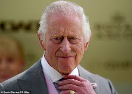 Nigel Farage squirms as he is challenged over calling King Charles a  'stupid, eco-loony'